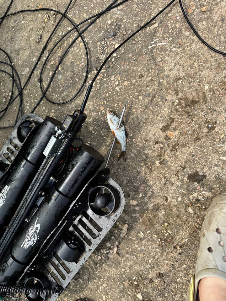 Underwater fishing drone next to a fresh catch